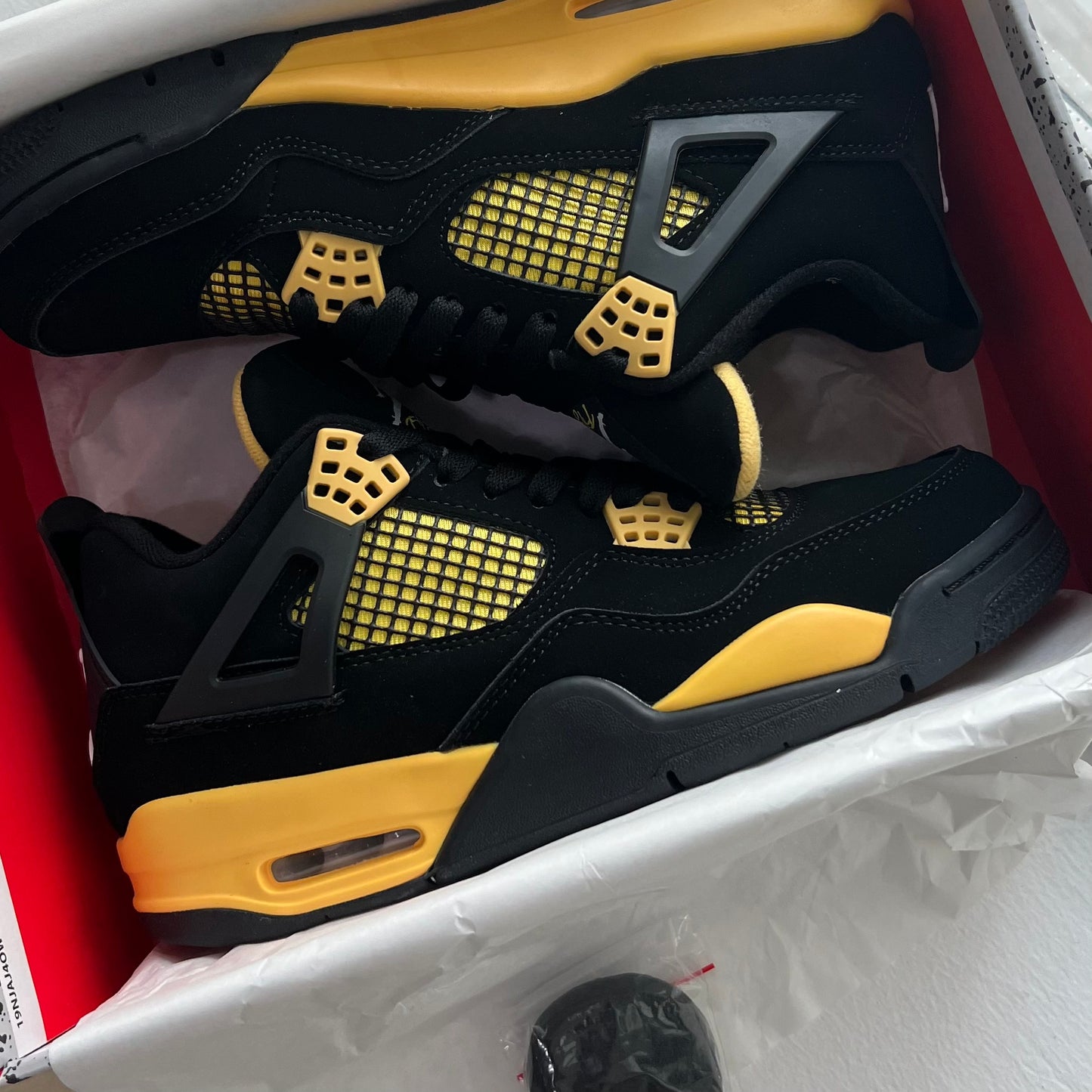 Air Jordan 4 “Yellow Thunder”