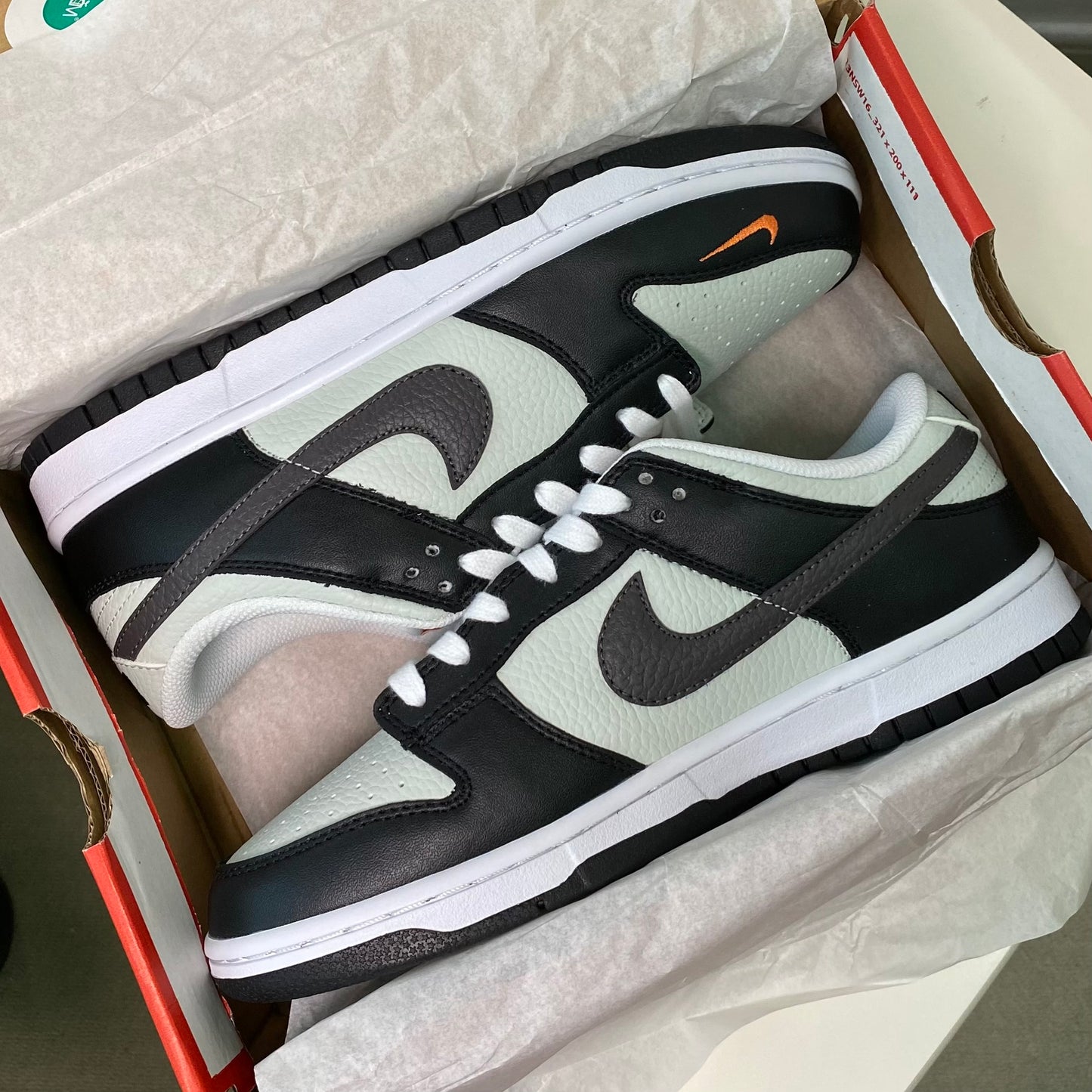 Nike Dunk Low “Black Bright Mandarin Mini Swoosh”